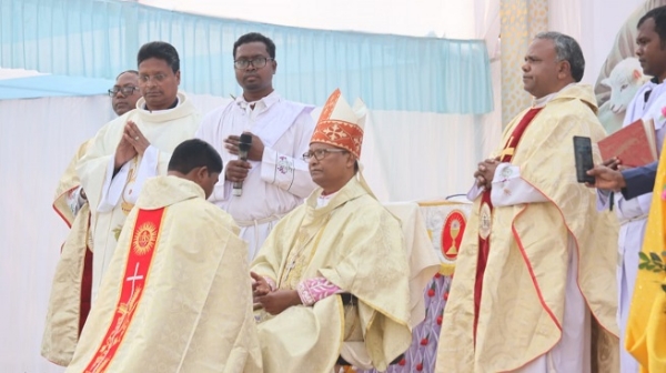 Father Simon Horo was ordained a priest