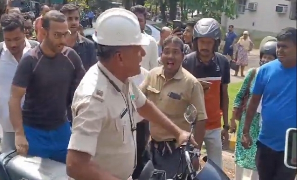 Traffic police chased woman and knocked her down
