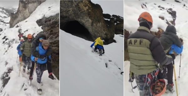 برفباری میں پھنسے سیاحوں کو بچاتے ہوئے پولیس اہلکار