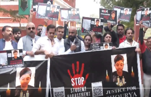 Family, parents & students protest outside St Columbus School