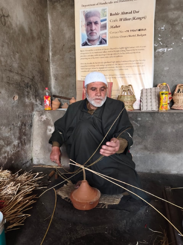 Ghulam Hassan Khadim, a kangri maker, at his workshop in Charar-i-Sharief. Ghulam Hassan Khadim, a kangri maker, at his workshop in Charar-i-Sharief.