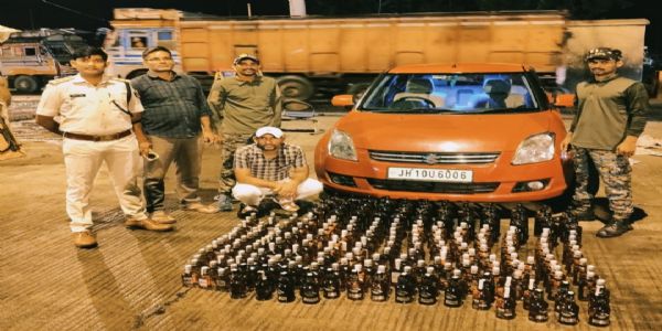 جانچ چوکی پر کار سے 98.640 لیٹر غیر ملکی شراب برآمد، اسمگلر گرفتار